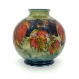 William Moorcroft, a Flambe Leaf and Blackberry vase