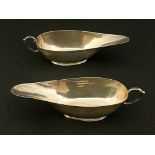 A pair of George V silver sauce boats, S Blackensee and Son, Birmingham 1922