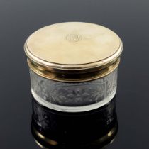 A French silver gilt and cut glass dressing table box