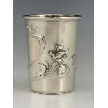 An Austrian secessionist silver beaker, embossed in the Art Nouveau style with foliate tendrils, 7.