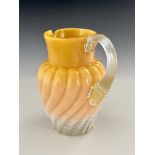 A Stourbridge peach opaque glass jug, probably Stevens and Williams, circa 1880, shouldered form,