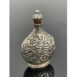 A victorian silver scent bottle