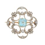 An Edwardian silver and gold, aquamarine and diamond floral openwork brooch