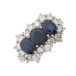 An 18ct gold sapphire and diamond cluster dress ring