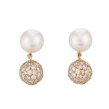 A pair of 18ct gold diamond and cultured pearl drop earrings