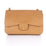 Chanel, a limited edition beige caviar Jumbo Classic Double Flap handbag