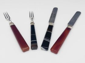 Two pairs of Victorian agate handled fruit knives and forks