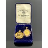 Two 9 carat gold and enamelled football medals