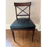 A set of four Regency mahogany dining chairs, circa 1820, tablet backs, X splats, studded leather