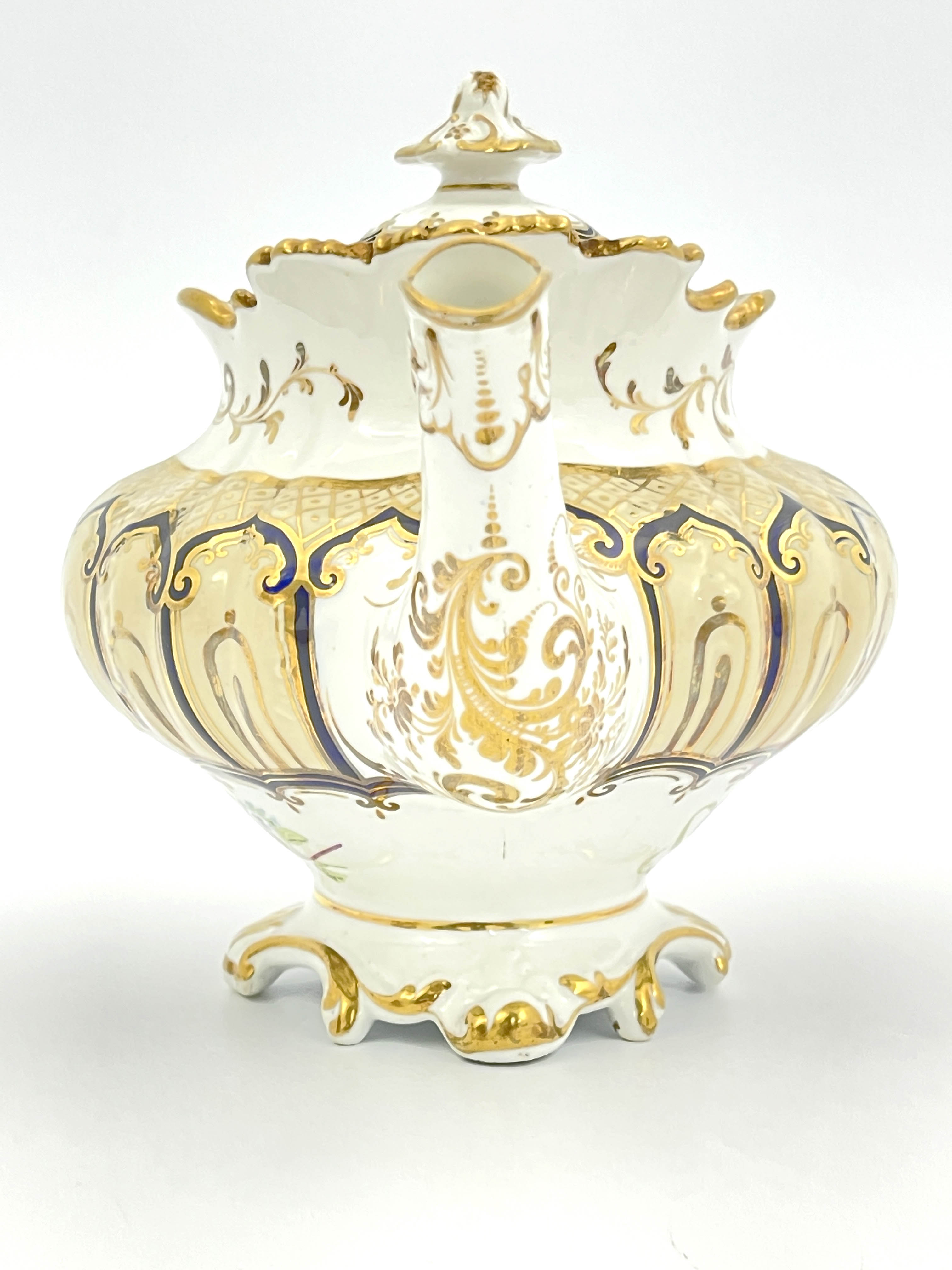 An English bone china teapot and cover, circa 1840, of Rococo design with gilt and blue ogee cover - Image 3 of 8