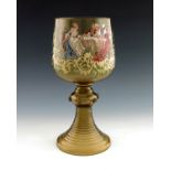 A late 19th Century oversized German amber glass roemer, transfer printed with a scene of 18th