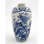 A Chinese blue and white slender shouldered baluster vase, painted with panels of birds amongst