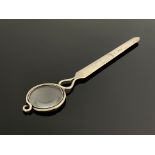 An Arts and Crafts silver magnifying letter opener