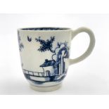 A Lowestoft Long Fence pattern coffee cup, workman's mark to base