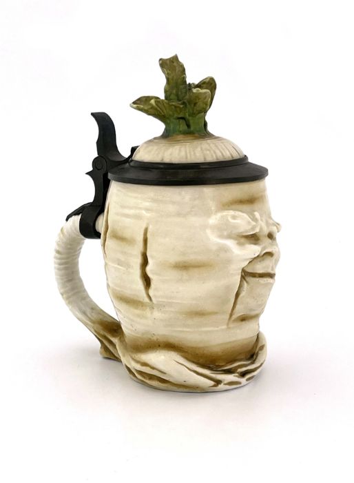 Schierholz, a novelty half litre character stein, modelled as a Sad Radish, pewter mount and inset