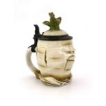 Schierholz, a novelty half litre character stein, modelled as a Sad Radish, pewter mount and inset