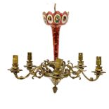 A cast brass five branch electrolier, early 20th century, of Rococo design, incorporating ruby
