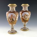 A pair of mid 19th Century Bohemain ruby opaque cased glass baluster vases, circa 1860, ogee
