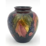 William Moorcroft, a Flambe Leaf and Berry vase