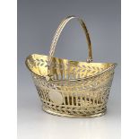 A late Victorian silver swing handled bon-bon basket, W. Co, London 1891, boat shaped, tortoiseshell