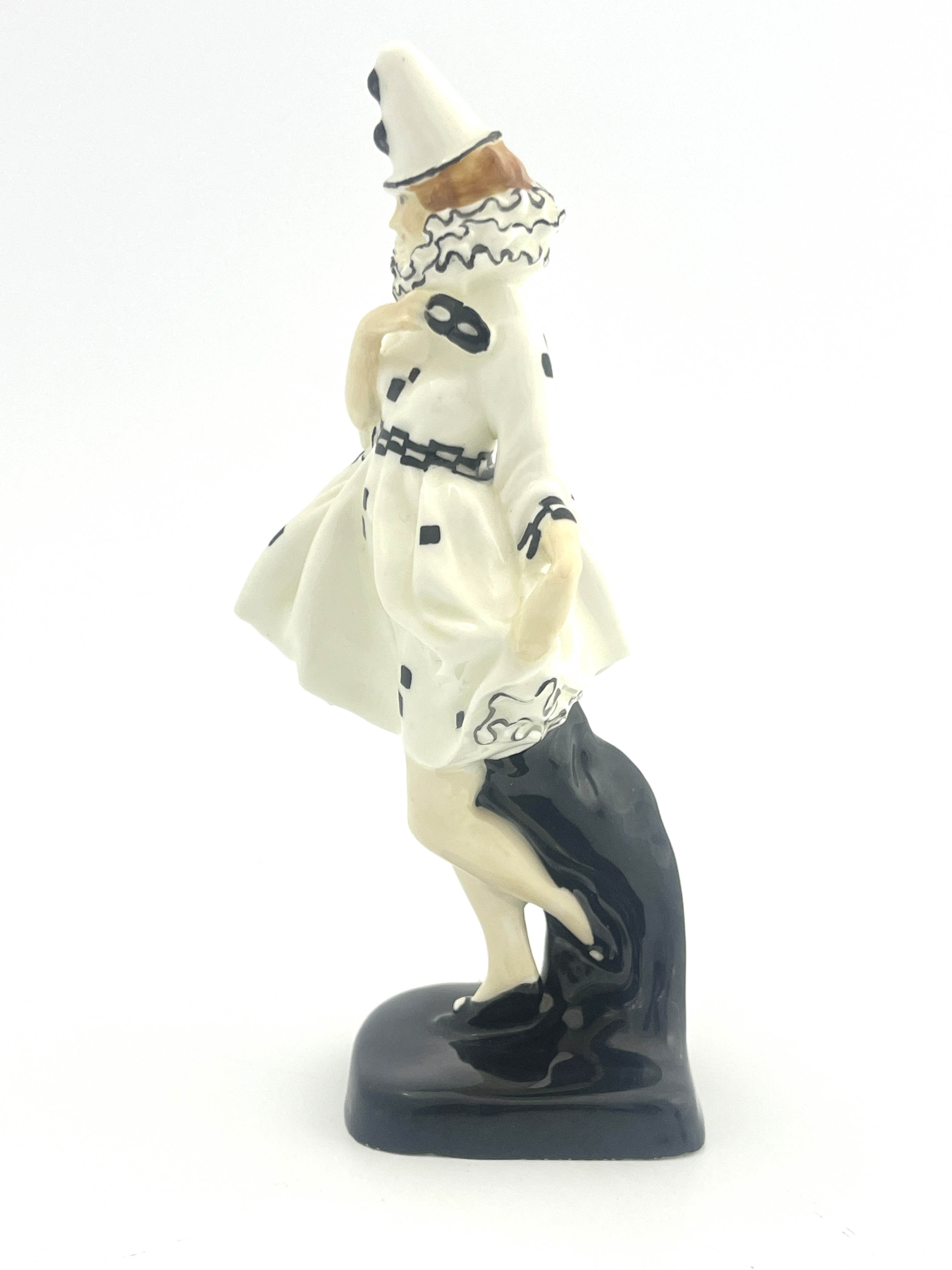 Leslie Harradine for Royal Doulton, a figure, Pierette, HN644, circa 1924, modelled as a clown in - Image 2 of 5