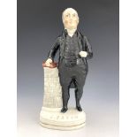 A 19th Century Staffordshire pottery figure of John Bryan, the Welsh Weselyan Methodist Mimister, (