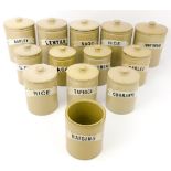 A set of thirteen Bourne Denby stoneware storage jars