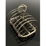 A George IV silver toast rack, London 1829, six se