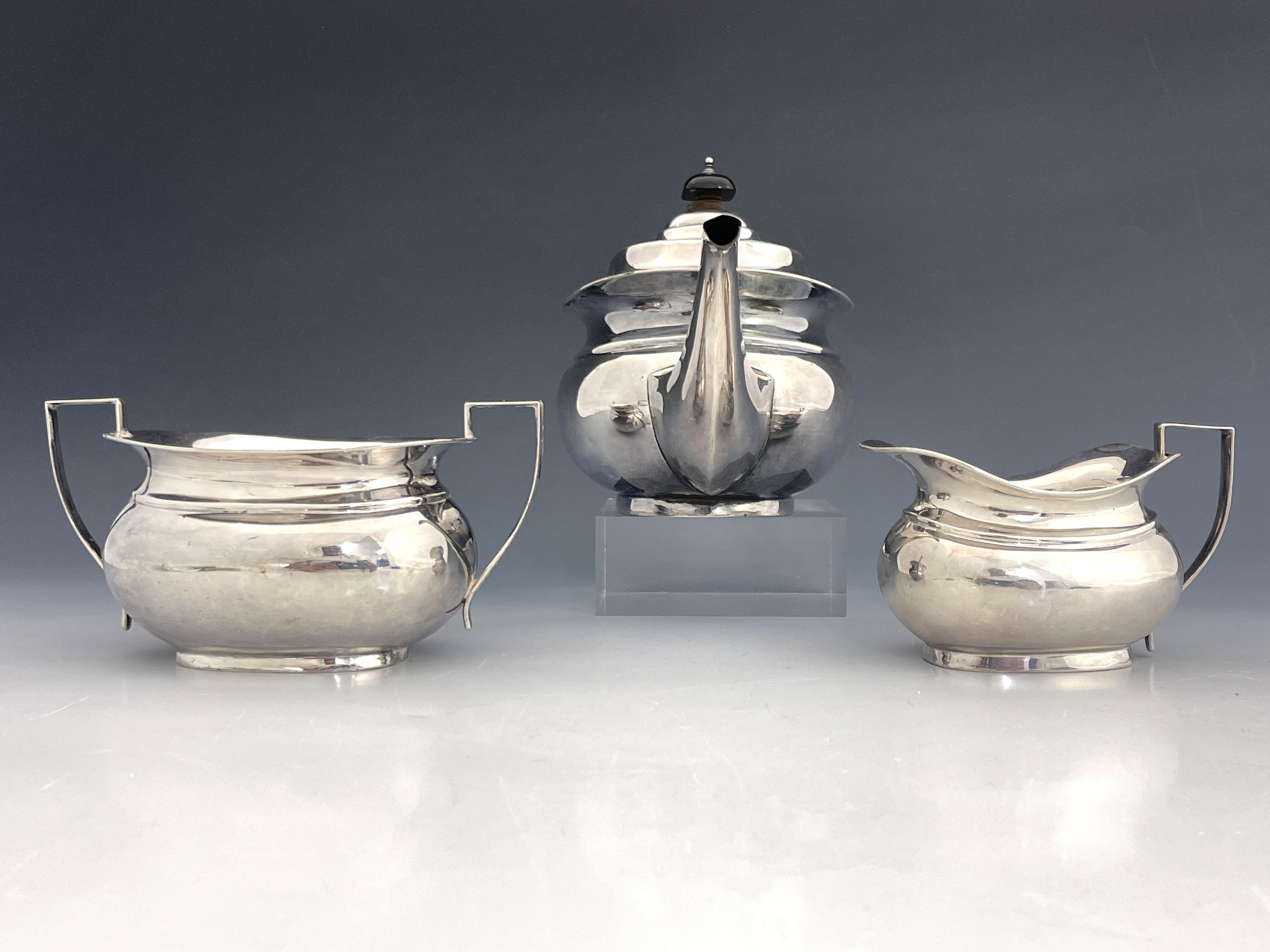 A George V silver three piece tea set, Burtons and Waters, Birmingham 1927 - Image 2 of 5