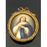A Vienna type porcelain plaque, oval form, painted with the Virgin Mary