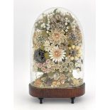 A Victorian Sailor's Valentine shell work floral bouquet,