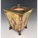 An Arts and Crafts copper and brass coal box
