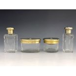 A set of four George V silver gilt cut glass jars, AP, London 1932