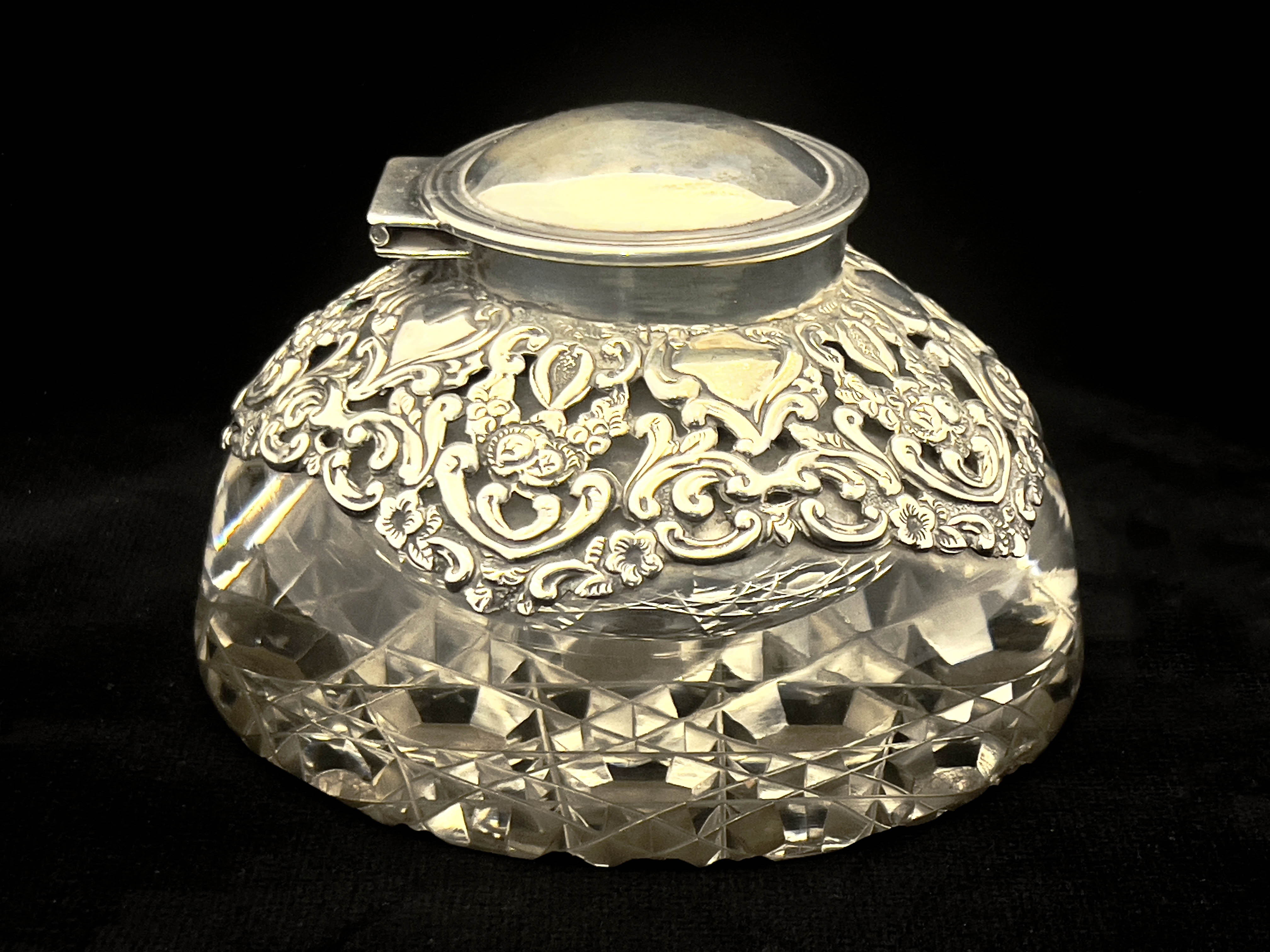 A Victorian silver mounted glass inkwell, Henry Matthews, Birmingham 1900