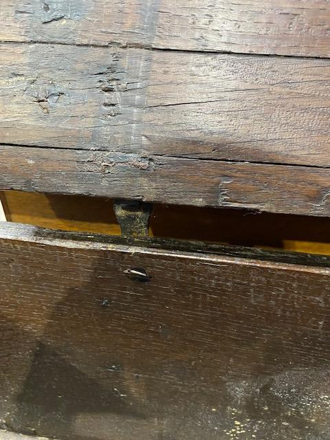 A 17th Century oak plank chest, moulded top with chip carved ends and corners, blacksmith hinges, - Image 5 of 10