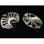 Two Jugendstil silver and hematite brooches, circa