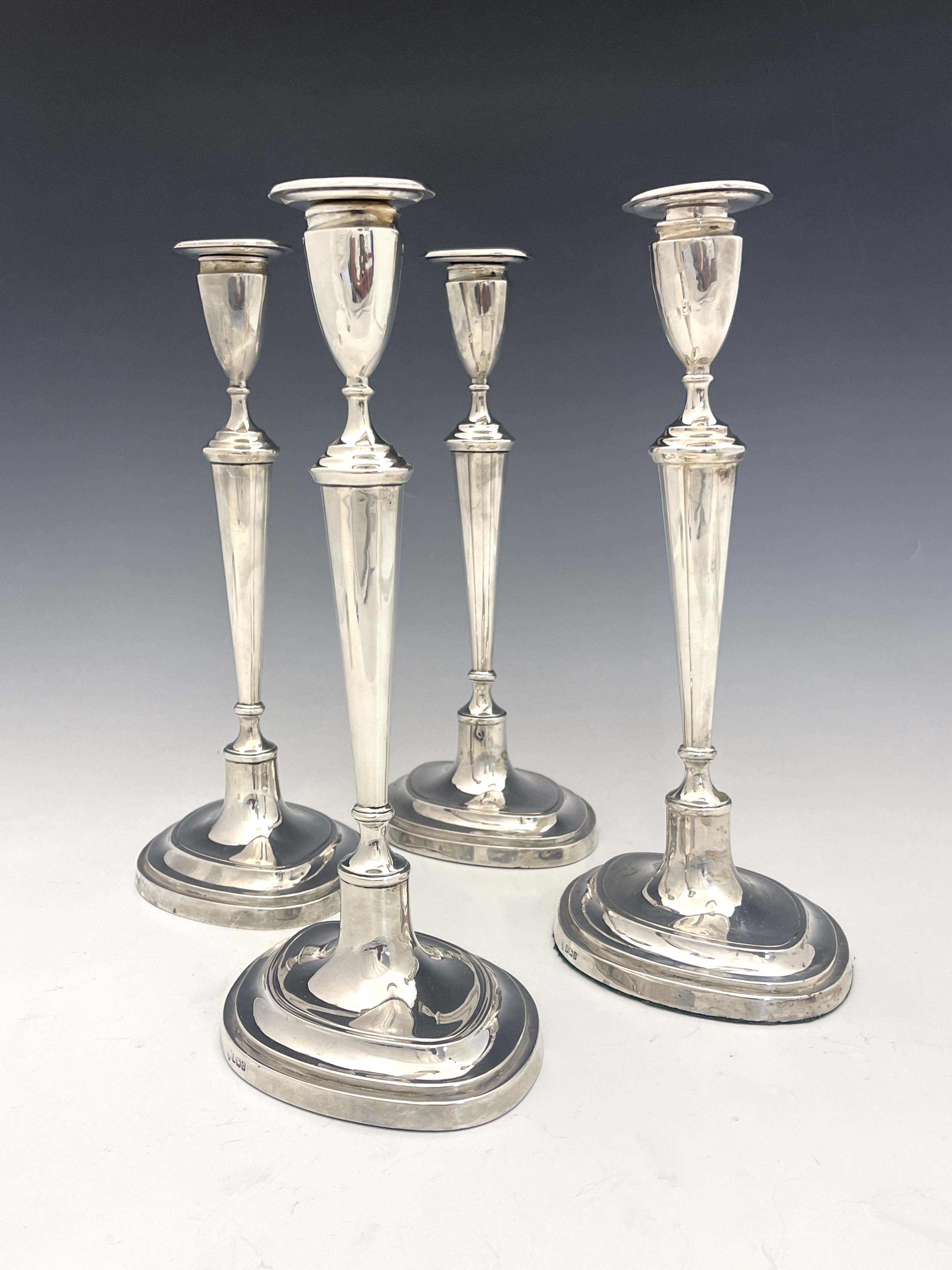 A set of four George V silver candlesticks, Hawksworth, Eyre and Co., Sheffield 1913 - Image 2 of 5