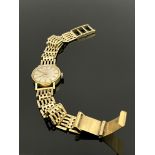 A 9 carat gold ladies wristwatch on bracelet strap