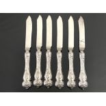 A set of six Arts and Crafts silver handled fruit knives, George Bulter and Co., Sheffield 1907