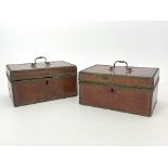 A pair of George III deed boxes, morocco bound with brass studded borders, swing handles to the ring