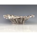 An Edwardian silver repousse bon-bon basket, Birmingham 1904, oval pierced with scroll border, 7.