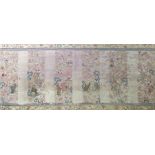 A Chinese silk embroidered panel, purple damask backing with vertical strips of figural garden and