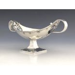 A E Jones for G L Connell, an Arts and Crafts silver twin handled dish, Birmingham 1913, pedestal
