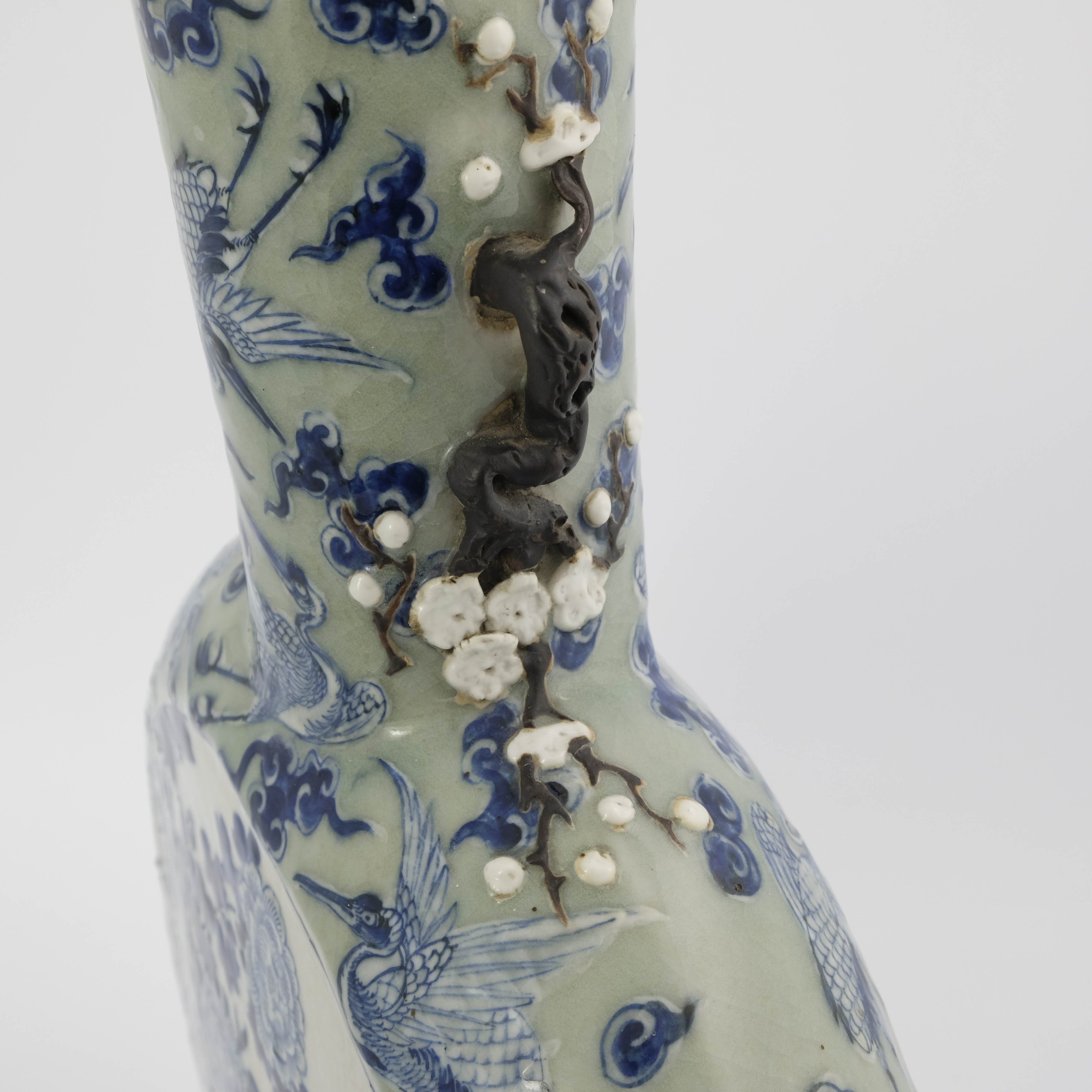 A large pair of Chinese relief moulded blue and white moonflask vases, Qing dynasty, incised four - Image 9 of 10