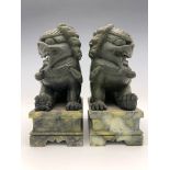 A pair of Chinese carved stone shishi guardian lions