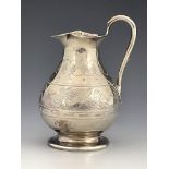 An Aesthetic Movement silver jug, George Richards, London 1851