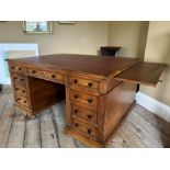 A mid Victorian walnut pedestal partners desk, cir