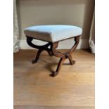 A William IV rosewood X framed stool, circa 1835, upholstered seat, the end supports united by a
