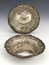 A pair of Edwardian reticulated silver dishes, Britton, Gould and Co., Birmingham 1903