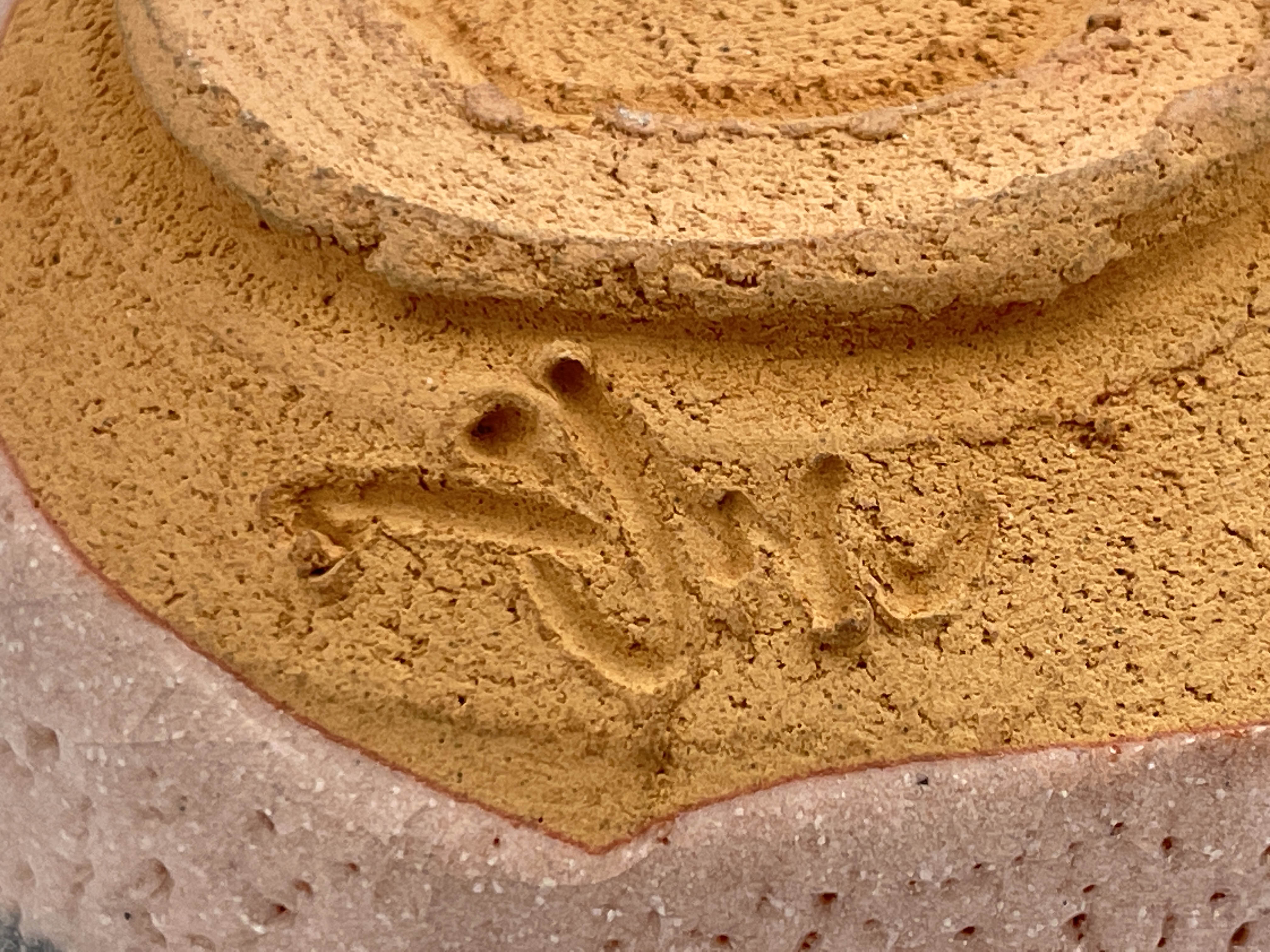 A Japanese Shino ware tea bowl, pitted cream glaze with brush work motifs, incised marks, 12cm wide - Image 5 of 5